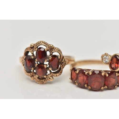 50 - THREE GARNET RINGS, the first a four stone garnet cluster prong set in yellow gold with scalloped de... 
