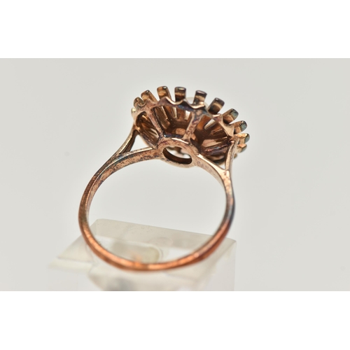 52 - A 9CT GOLD CULTURED PEARL RING, an abstract floral design set with a single cultured pearl, hallmark... 