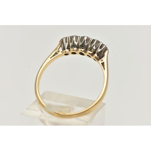 6 - A FIVE STONE DIAMOND RING, five old cut diamonds prong set in white metal, leading on to a yellow me... 