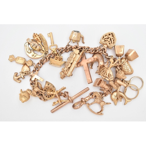 63 - A 9CT GOLD CHARM BRACELET, curb link bracelet, each linked stamped 9.375, fitted with a T-bar hallma... 