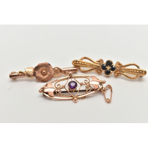 65 - THREE BROOCHES, to include a rose gold flower bar brooch, fitted with a brooch pin and safety clasp,... 