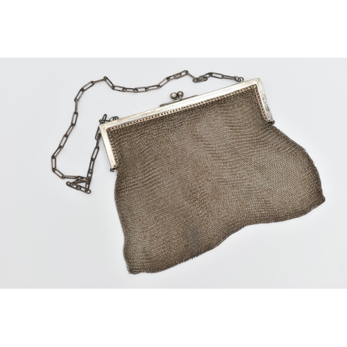 74 - A WHITE METAL MESH PURSE, fitted with an elongated oval chain strap (condition report: general moder... 