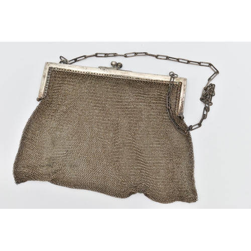 74 - A WHITE METAL MESH PURSE, fitted with an elongated oval chain strap (condition report: general moder... 