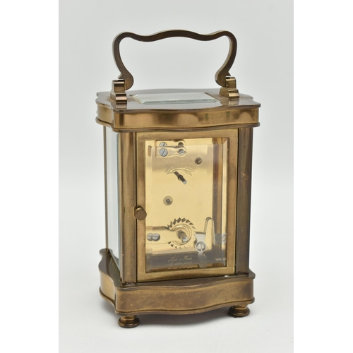 76 - AN 'ANGELUS' BRASS CARRIAGE CLOCK, key wound movement, rectangular face, Roman numerals with Arabic ... 