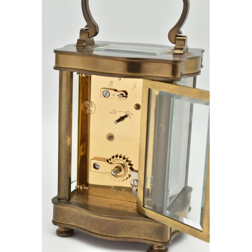 76 - AN 'ANGELUS' BRASS CARRIAGE CLOCK, key wound movement, rectangular face, Roman numerals with Arabic ... 