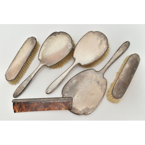 86 - A SIX PIECE SILVER DRESSING TABLE SET, comprising of two hair brushes, a comb, two clothes brushes a... 