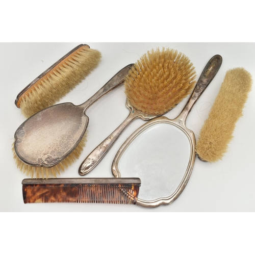 86 - A SIX PIECE SILVER DRESSING TABLE SET, comprising of two hair brushes, a comb, two clothes brushes a... 