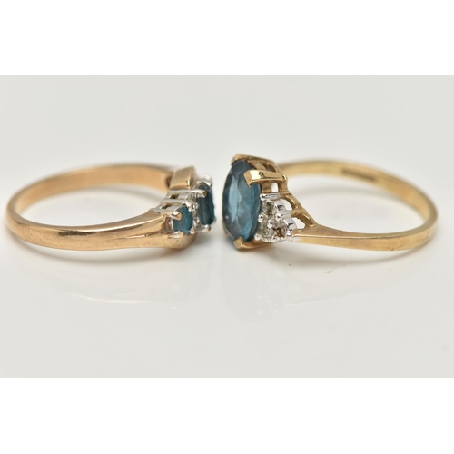 93 - TWO 9CT GOLD GEM SET RINGS, the first an oval cut blue topaz, flanked with six single cut diamonds, ... 