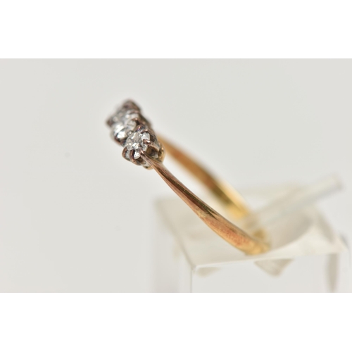 96 - A THREE STONE DIAMOND RING, a centrally set old cut diamond, prong set in white metal with two round... 