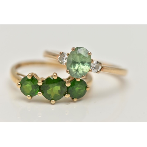 97 - TWO 9CT GOLD GEM SET RINGS, the first a three stone chrome diopside ring, prong set in yellow gold, ... 