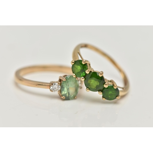 97 - TWO 9CT GOLD GEM SET RINGS, the first a three stone chrome diopside ring, prong set in yellow gold, ... 