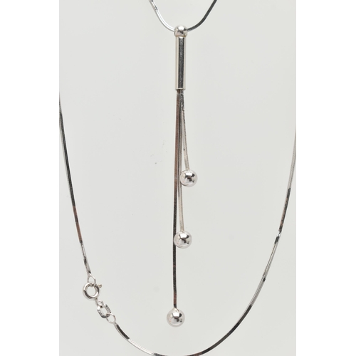 99 - A 9CT WHITE GOLD LARIAT STYLE NECKLACE, fine box chain leading on to a tassel style drop pendant, ea... 