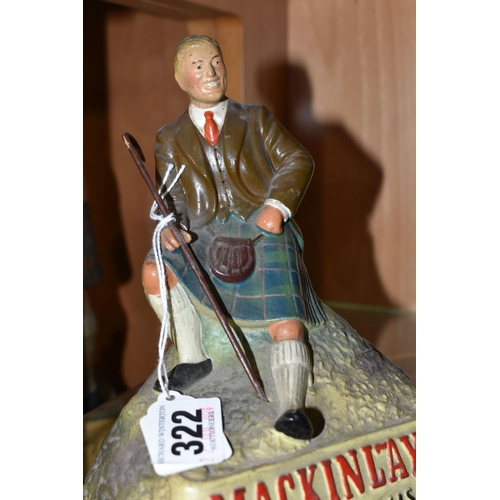 322 - BREWERIANA: THREE WHISKY ADVERTISING FIGURES, comprising two rubberoid Mackinlay's Scotch Whisky hig... 