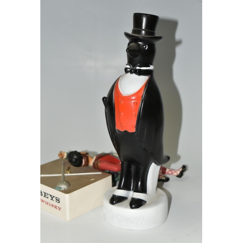 323 - BREWERIANA: TWO WHISKY ADVERTISING FIGURES, comprising an 'Old Crow' (Kentucky Straight Bourbon Whis... 