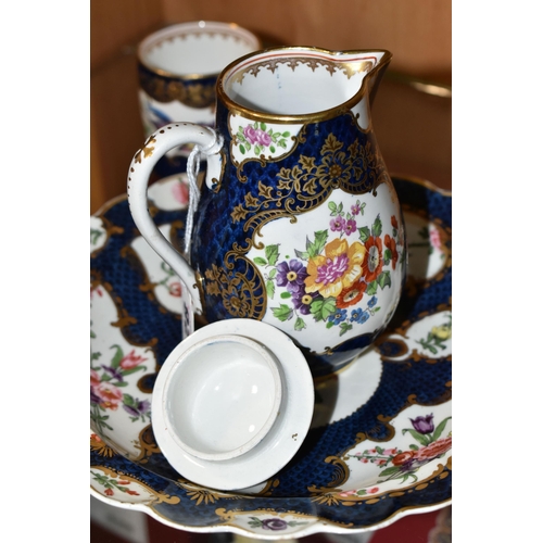 328 - A SMALL COLLECTION OF PORCELAIN, comprising a porcelain covered chocolate pot with a red rose finial... 