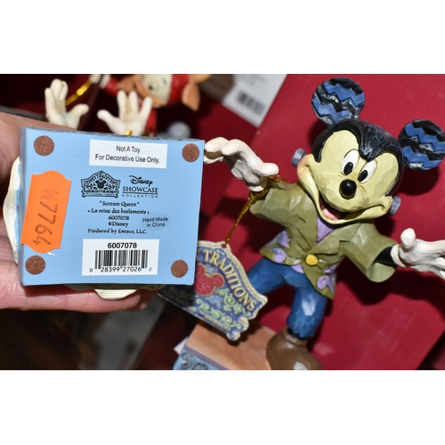 331 - FOUR BOXED DISNEY TRADITIONS SHOWCASE COLLECTION HALLOWEEN 'MICKEY MOUSE' FIGURES, comprising 'Terri... 