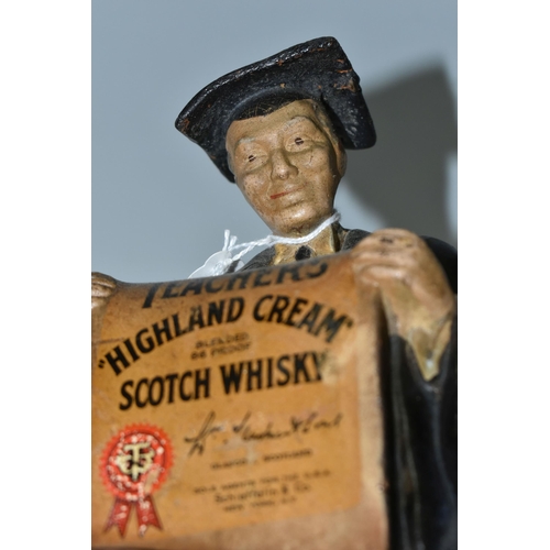 334 - BREWERIANA: A TEACHER'S 'HIGHLAND CREAM' SCOTCH WHISKY ADVERTISING DISPLAY FIGURE, a rubberoid figur... 