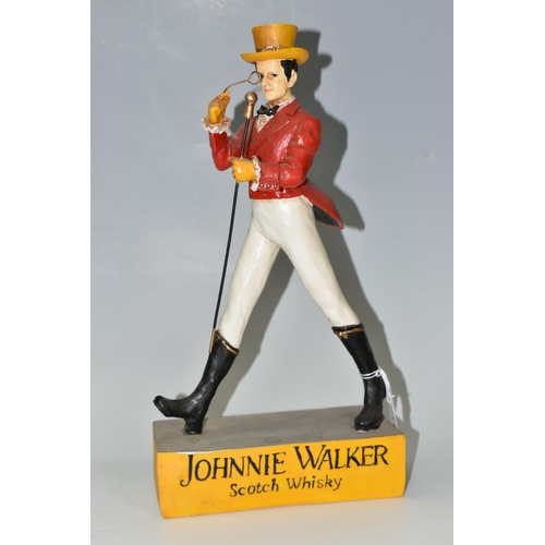 335 - BREWERIANA: A RESIN JOHNNY WALKER WHISKY ADVERTISING FIGURE, with top hat, monocle and walking cane,... 