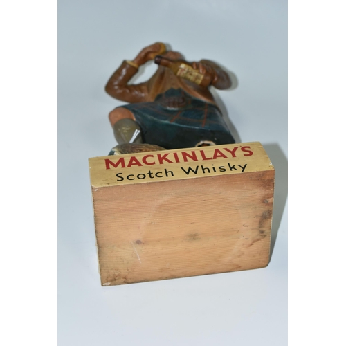 337 - BREWERIANA: A MACKINLAY'S SCOTCH WHISKY ADVERTISING FIGURE, 'There's No Use Talking- Taste It! Says ... 