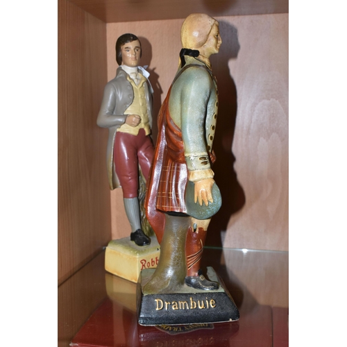 340 - BREWERIANA: TWO WHISKY ADVERTISING FIGURES, comprising two rubberoid figures 'Robbie Burns' famed ol... 