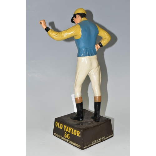 341 - BREWERIANA: AN OLD TAYLOR 86 KENTUCKY STRAIGHT BOURBON WHISKEY ADVERTISING FIGURE, rubberoid figure ... 