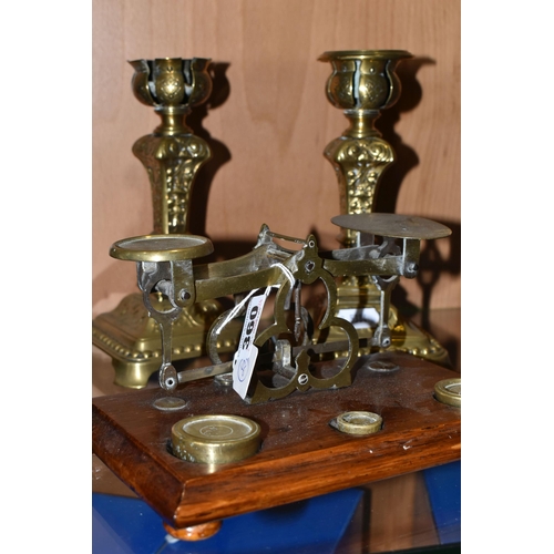 360 - A SET OF BRASS POSTAL SCALES, comprising scales set on an oak plinth with 4oz, 2oz and 1.5 oz brass ... 