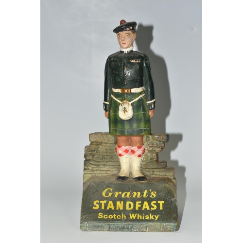 367 - A GRANT'S STANDFAST SCOTCH WHISKY ADVERTISING FIGURE, the rubberoid figure in the form of a Scottish... 