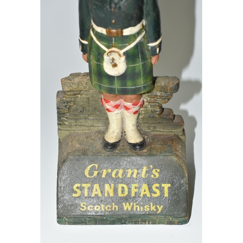 367 - A GRANT'S STANDFAST SCOTCH WHISKY ADVERTISING FIGURE, the rubberoid figure in the form of a Scottish... 