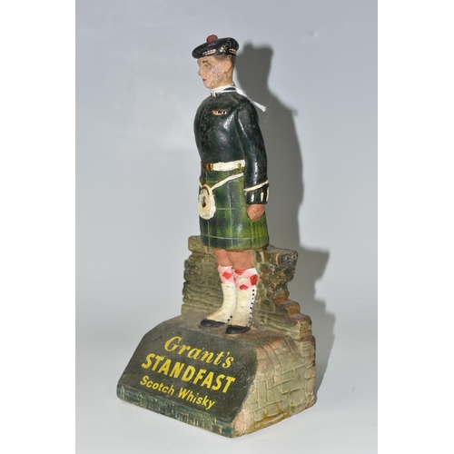 367 - A GRANT'S STANDFAST SCOTCH WHISKY ADVERTISING FIGURE, the rubberoid figure in the form of a Scottish... 