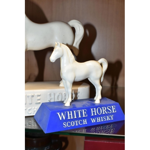 368 - TWO WHITE HORSE SCOTCH WHISKY ADVERTISING FIGURES, comprising a white ceramic Kelsboro Ware white ho... 