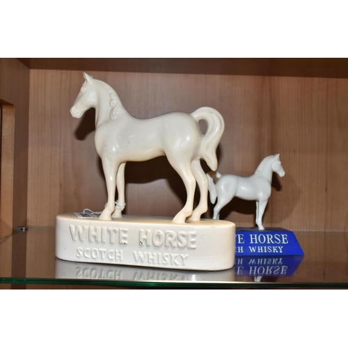 368 - TWO WHITE HORSE SCOTCH WHISKY ADVERTISING FIGURES, comprising a white ceramic Kelsboro Ware white ho... 