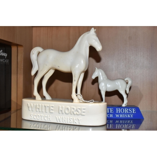 368 - TWO WHITE HORSE SCOTCH WHISKY ADVERTISING FIGURES, comprising a white ceramic Kelsboro Ware white ho... 