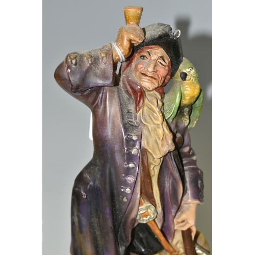 376 - A SCOTCH WHISKY ADVERTISING FIGURE AND DECANTER, comprising  a chalkware 'Long John Scotch Whisky' a... 