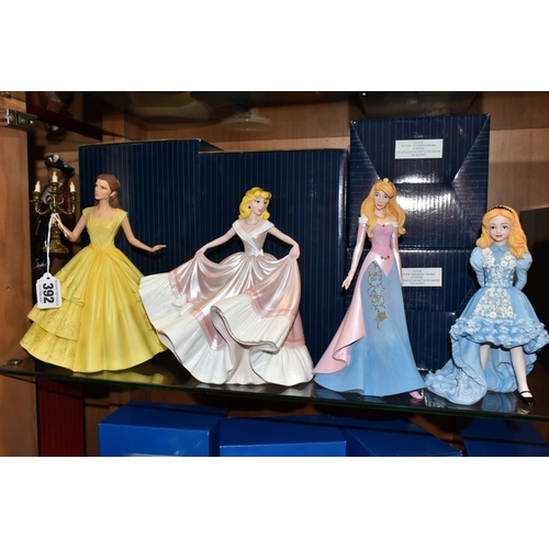 392 - FOUR BOXED ENESCO DISNEY SHOWCASE COLLECTION FIGURES, comprising Belle no 4058293, Cinderella no 600... 