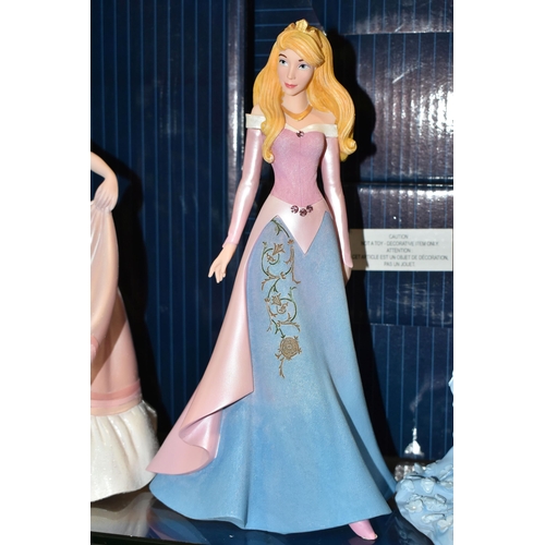 392 - FOUR BOXED ENESCO DISNEY SHOWCASE COLLECTION FIGURES, comprising Belle no 4058293, Cinderella no 600... 