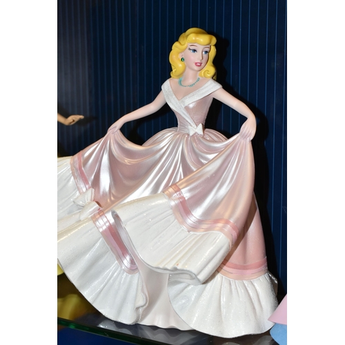 392 - FOUR BOXED ENESCO DISNEY SHOWCASE COLLECTION FIGURES, comprising Belle no 4058293, Cinderella no 600... 