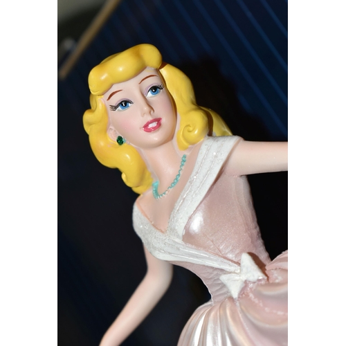 392 - FOUR BOXED ENESCO DISNEY SHOWCASE COLLECTION FIGURES, comprising Belle no 4058293, Cinderella no 600... 