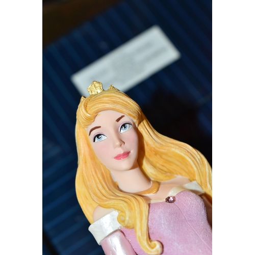 392 - FOUR BOXED ENESCO DISNEY SHOWCASE COLLECTION FIGURES, comprising Belle no 4058293, Cinderella no 600... 