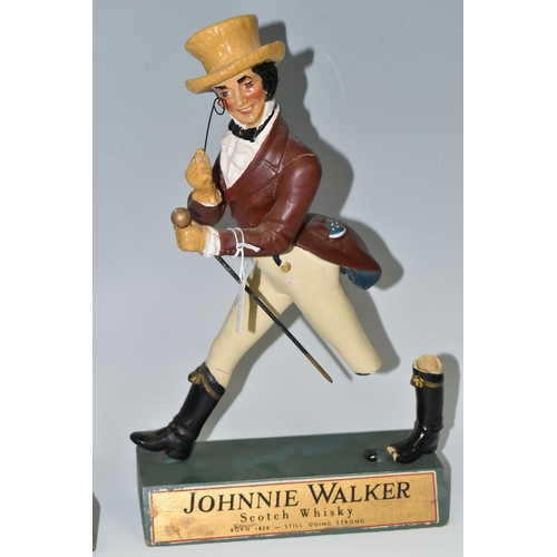 395 - TWO WHISKY ADVERTISING FIGURES, comprising  a rubberoid 'Johnnie Walker Scotch Whisky' advertising f... 