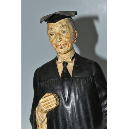 397 - A TEACHER'S SCOTCH WHISKY ADVERTISING FIGURE, the rubberoid figure in the form of a teacher in cap a... 