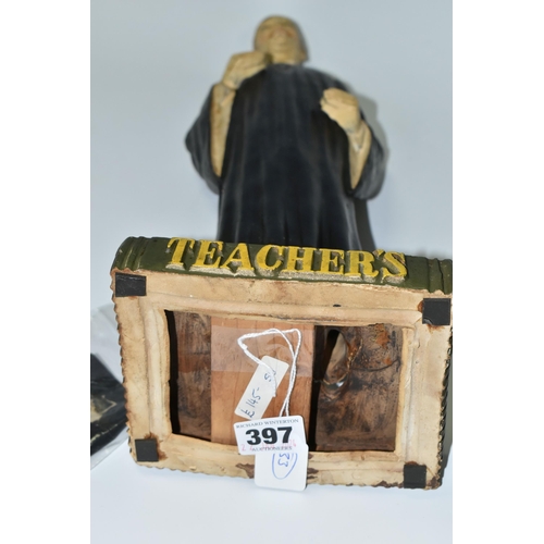 397 - A TEACHER'S SCOTCH WHISKY ADVERTISING FIGURE, the rubberoid figure in the form of a teacher in cap a... 