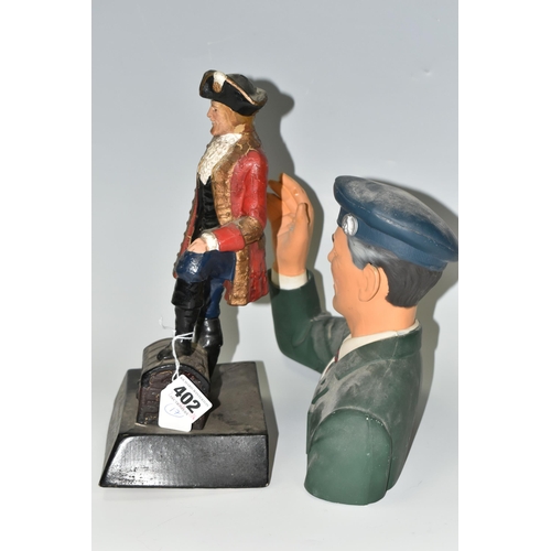 402 - TWO WHISKY ADVERTISING FIGURES, comprising a rubberoid 'Old Smuggler' advertising figure depicting a... 