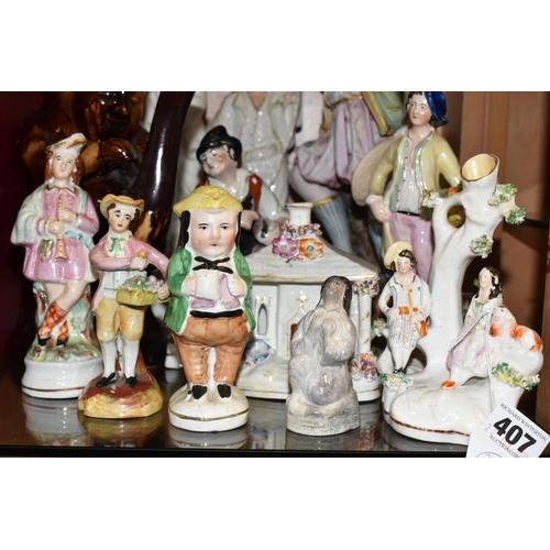 407 - A COLLECTION OF NINETEENTH CENTURY STAFFORDSHIRE AND SIMILAR FIGURES, to include a treacle glazed To... 