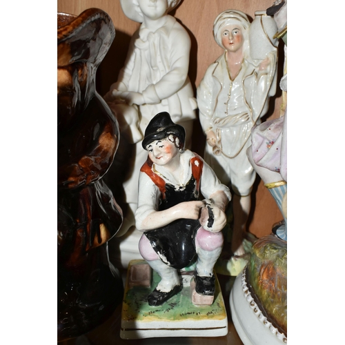 407 - A COLLECTION OF NINETEENTH CENTURY STAFFORDSHIRE AND SIMILAR FIGURES, to include a treacle glazed To... 