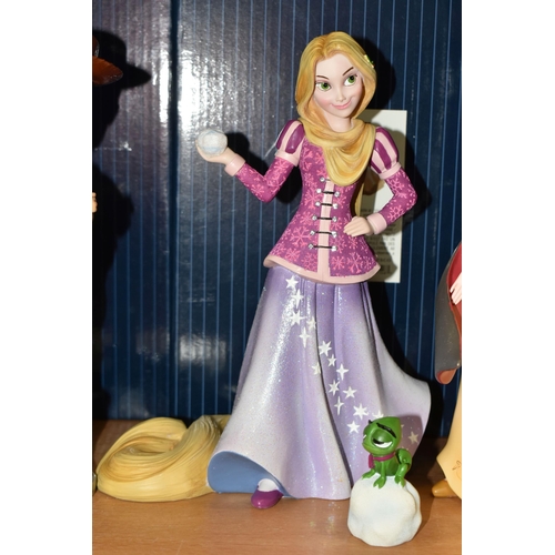 410 - FOUR BOXED ENESCO DISNEY SHOWCASE FIGURES,  comprising Rapunzel with Pascal (two figures in one) no ... 