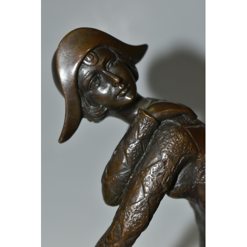 423 - AFTER DEMETRE CHIPARUS, A BRONZE 'HARLEQUIN' FIGURE, modelled glancing over her shoulder, standing o... 