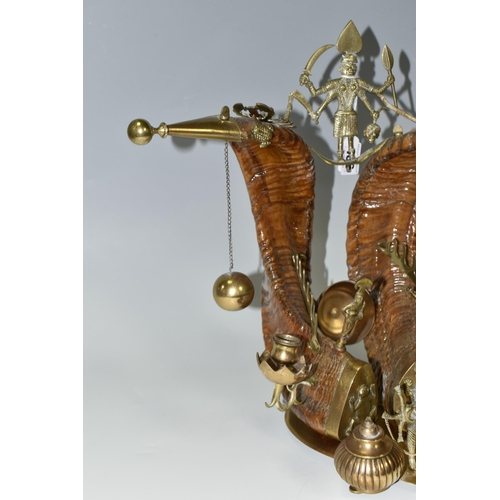 436 - AN ANGLO/INDIAN COLONIAL RAM'S HORN AND BRASS INK STAND,  Ram's horn standish with two inkwells, pen... 