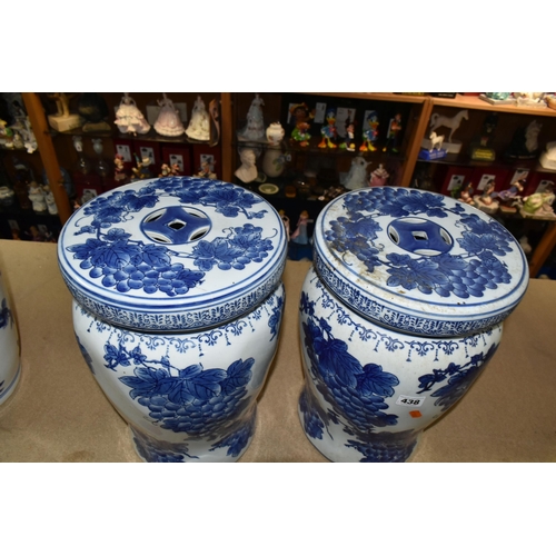 438 - A PAIR OF CHINESE BLUE AND WHITE PORCELAIN GARDEN SEATS, decorated overall with grapes and vines, pi... 