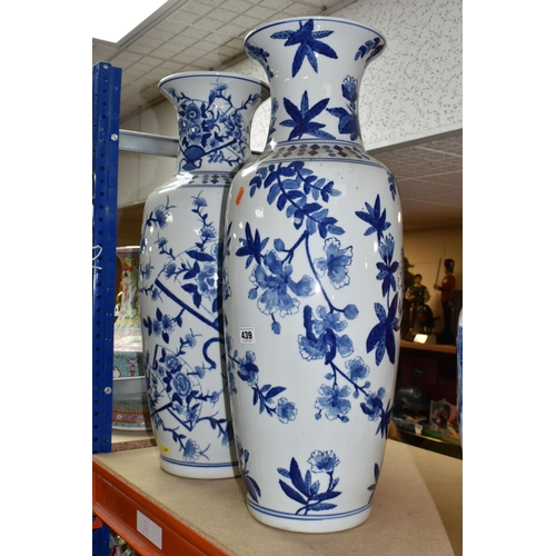 439 - TWO LARGE ORIENTAL DESIGN FLOOR VASES, blue and white porcelain, one vase is decorated with Oriental... 