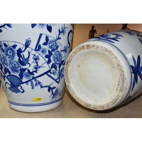 439 - TWO LARGE ORIENTAL DESIGN FLOOR VASES, blue and white porcelain, one vase is decorated with Oriental... 